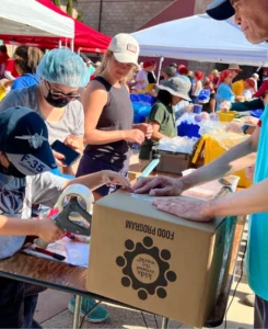 Volunteers packing 2 million meals at Casa de los Pobres USA event in San Diego