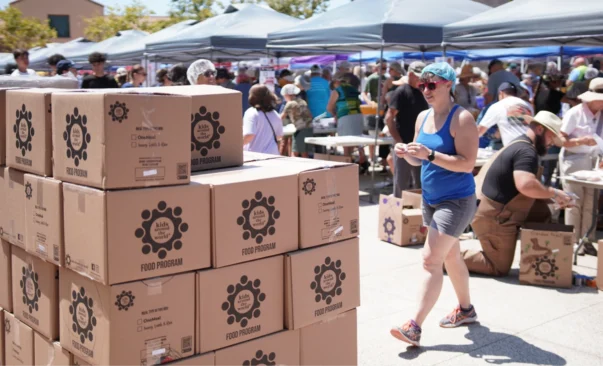 Boxes of food to be packed at Casa de los Pobres USA event in San Diego