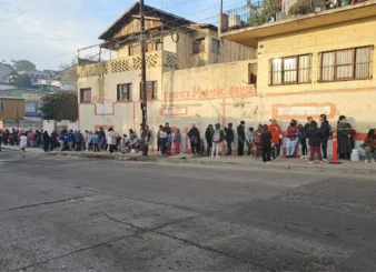 The poor of Tijuana waiting for the Casa de los Pobres to open for breakfast