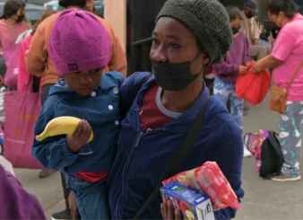 Children and adults receive clothes and food at Casa de los Pobres Tijuana