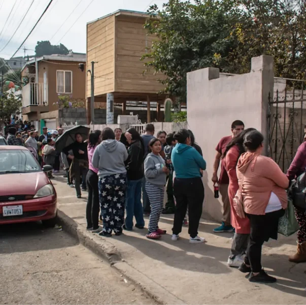 The poor wait for breakfast at the Casa de los Pobres in Tijuana Mexico